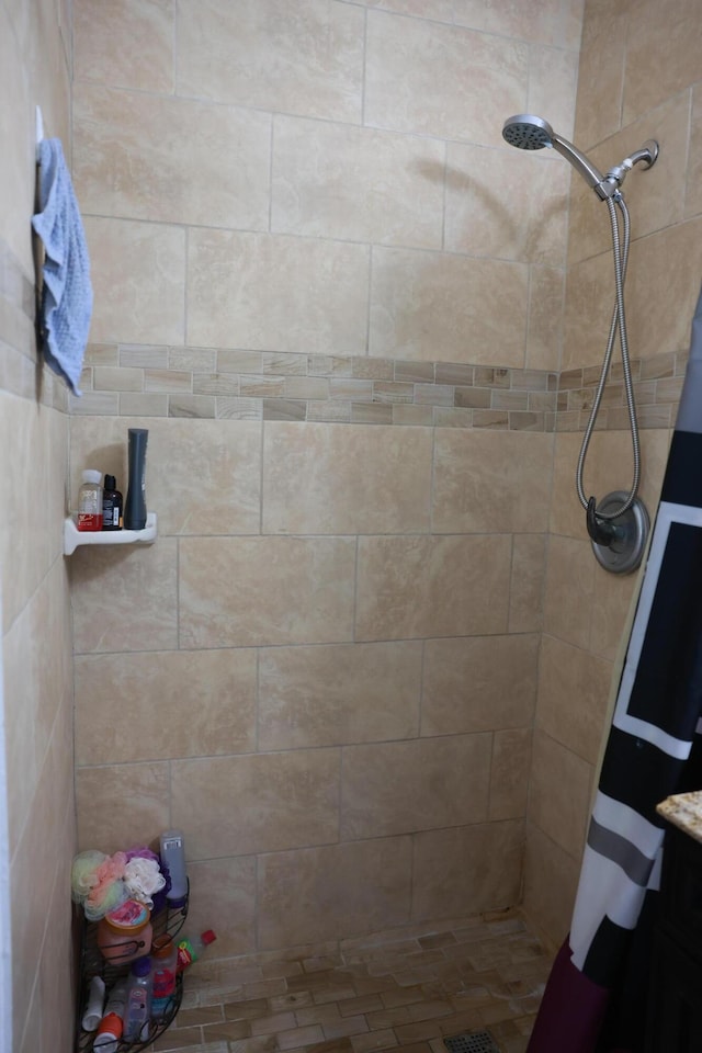 bathroom featuring a stall shower