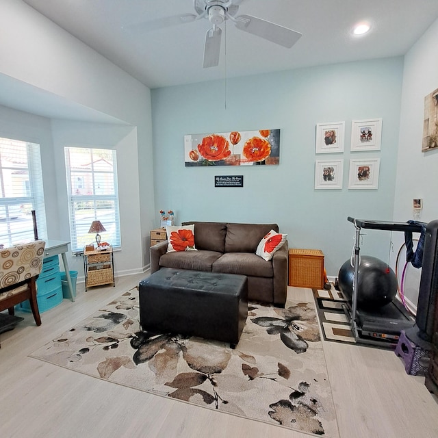 living area featuring recessed lighting, baseboards, a ceiling fan, and wood finished floors