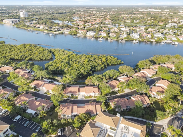 aerial view with a residential view and a water view