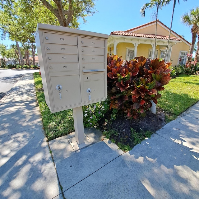 view of property's community with mail area