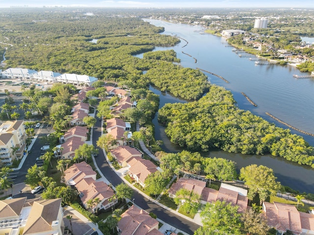 bird's eye view with a residential view and a water view