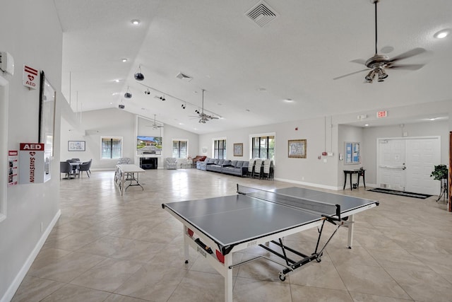 game room with light tile patterned floors, a ceiling fan, and visible vents