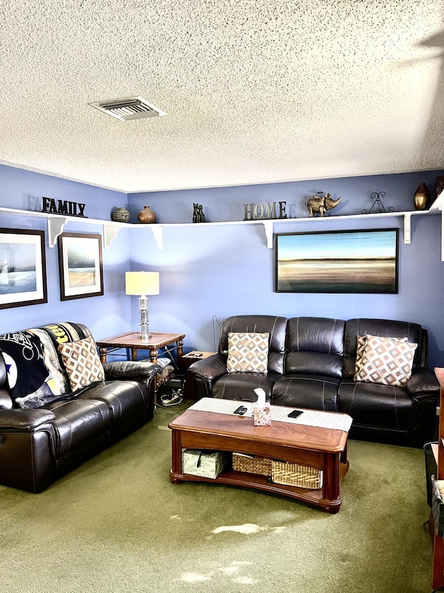 living room featuring carpet, visible vents, and a textured ceiling