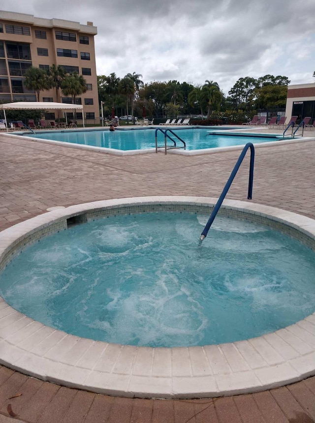 community pool with a patio