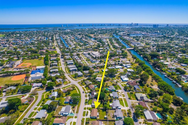 birds eye view of property featuring a water view