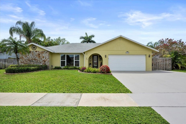 ranch-style house featuring stucco siding, fence, concrete driveway, a front yard, and a garage