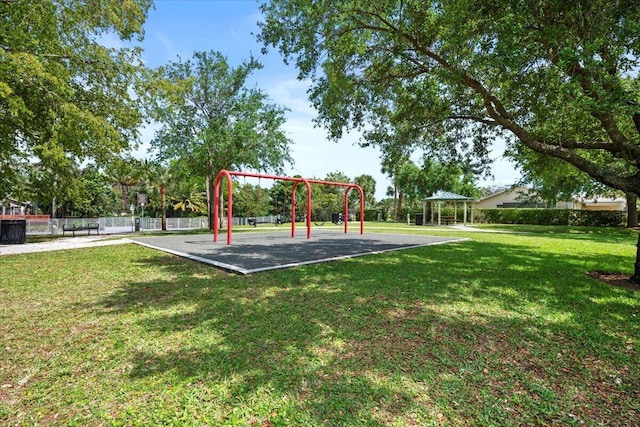 community play area with a gazebo and a lawn