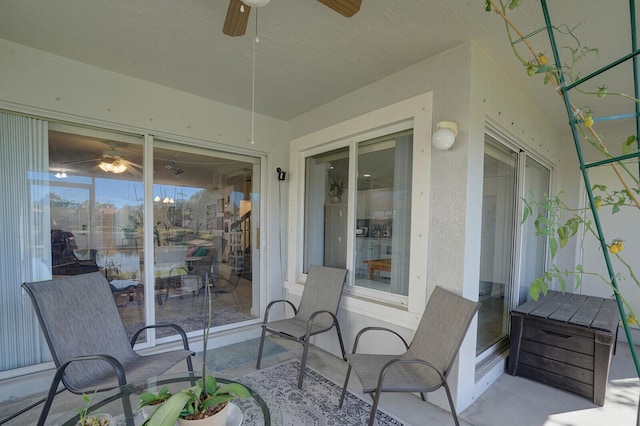 view of patio / terrace featuring ceiling fan