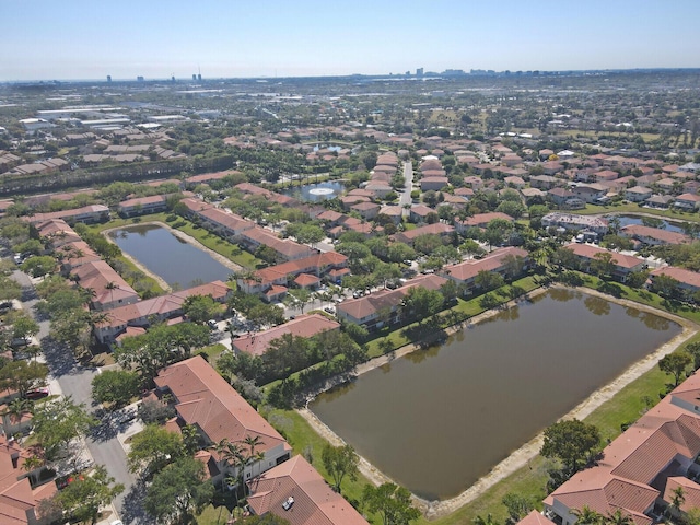 bird's eye view with a water view and a residential view