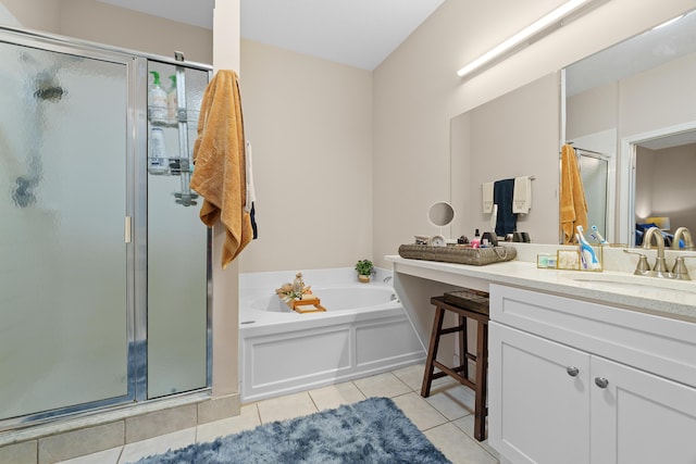 full bathroom with tile patterned floors, vanity, a bath, and a shower stall