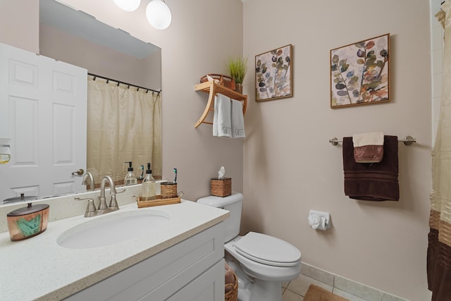 full bathroom featuring vanity, baseboards, tile patterned flooring, curtained shower, and toilet