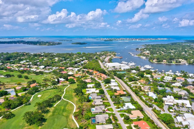 bird's eye view featuring a residential view, golf course view, and a water view