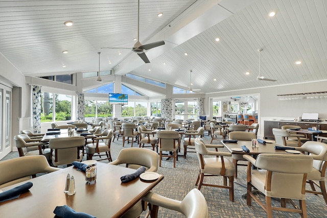 dining room with beam ceiling, recessed lighting, a wealth of natural light, and ceiling fan