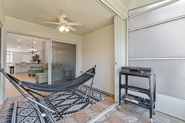 view of patio / terrace featuring a ceiling fan