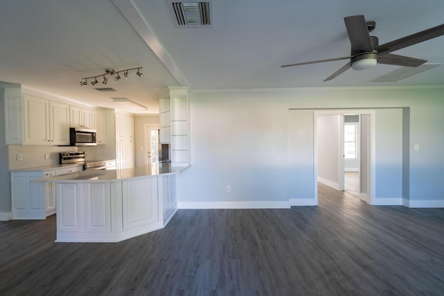 kitchen featuring a ceiling fan, dark wood-style floors, visible vents, stainless steel appliances, and white cabinetry