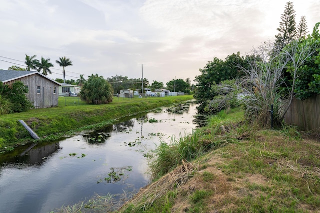 water view featuring fence