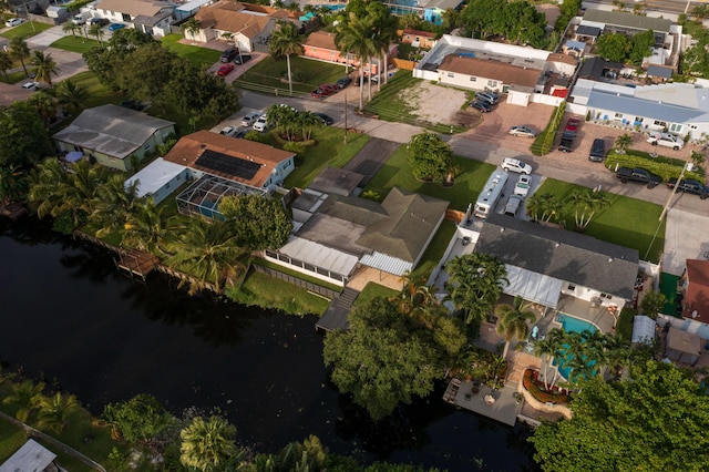 birds eye view of property with a residential view