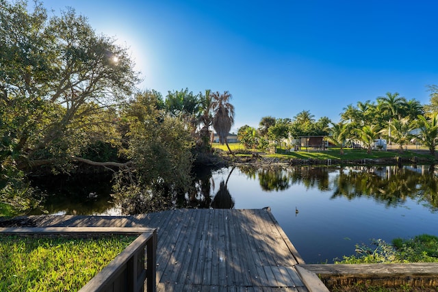 dock area featuring a water view