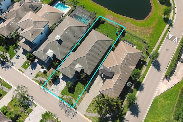 birds eye view of property with a residential view