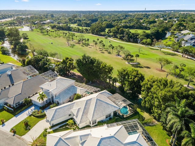 bird's eye view featuring a water view and golf course view