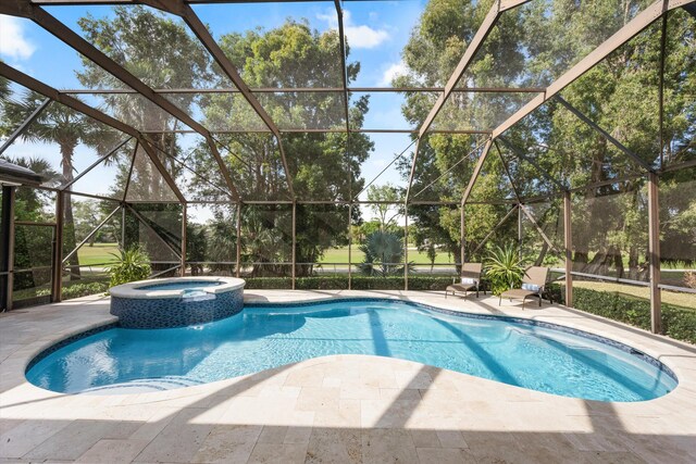 9637 Spray Dr, West Palm Beach, FL 33411 - view of pool featuring a patio area, a pool with connected hot tub, and glass enclosure