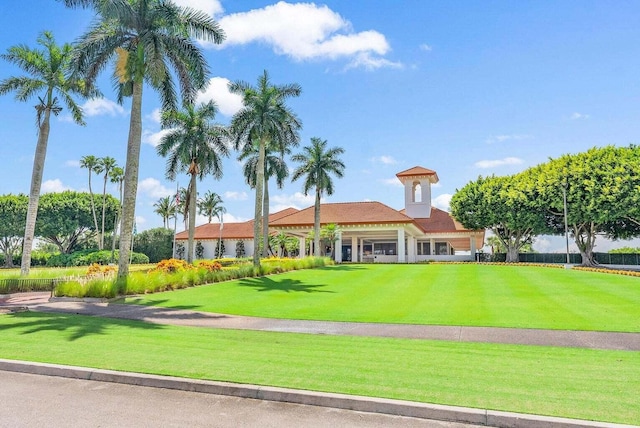 surrounding community featuring a yard