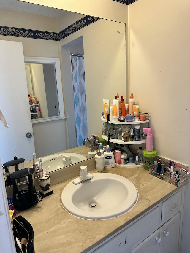 148 Yacht Club Dr Unit 13, North Palm Beach, FL 33408 - bathroom featuring vanity and curtained shower
