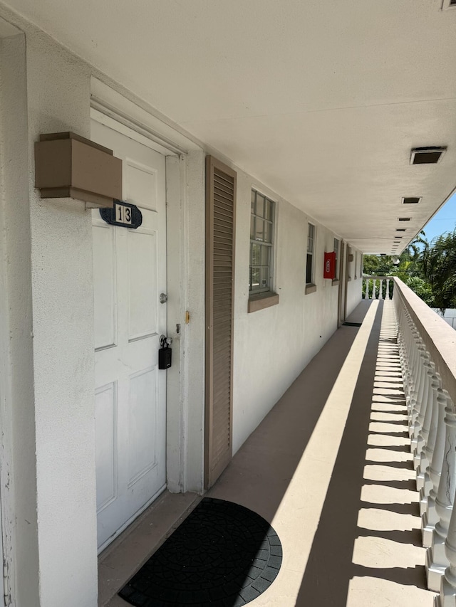 148 Yacht Club Dr Unit 13, North Palm Beach, FL 33408 - property entrance with stucco siding