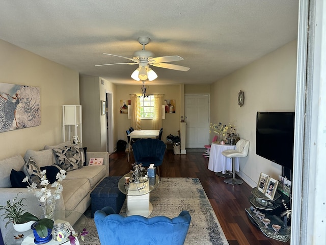 148 Yacht Club Dr Unit 13, North Palm Beach, FL 33408 - living area featuring a ceiling fan and dark wood-type flooring