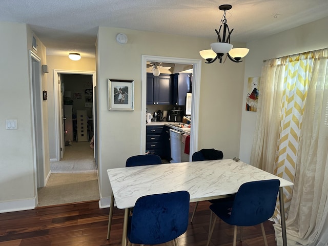 148 Yacht Club Dr Unit 13, North Palm Beach, FL 33408 - dining room with visible vents, baseboards, dark wood-style floors, and a chandelier
