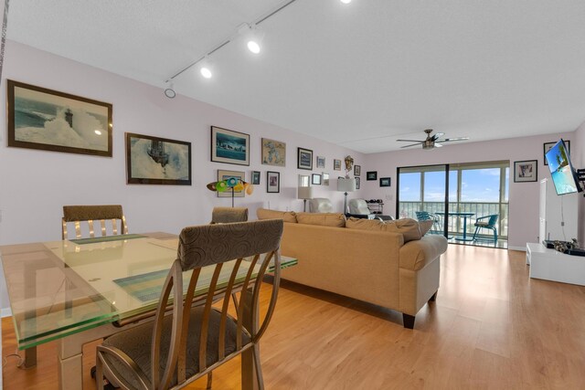 7240 Huntington Ln Unit 802, Delray Beach, FL 33446 - dining area with light wood-style floors and a ceiling fan