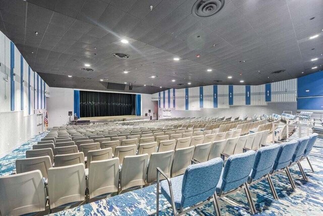 7240 Huntington Ln Unit 802, Delray Beach, FL 33446 - home theater featuring visible vents