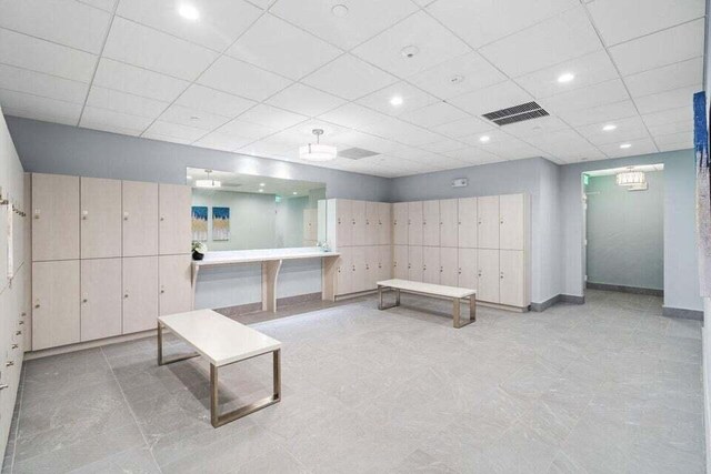 7240 Huntington Ln Unit 802, Delray Beach, FL 33446 - interior space featuring baseboards, visible vents, recessed lighting, and a paneled ceiling