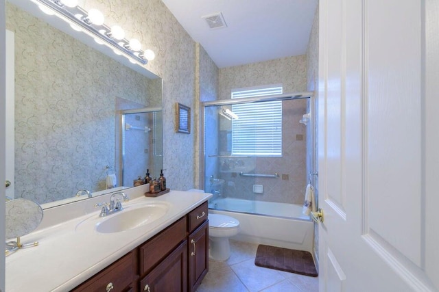 bathroom with visible vents, toilet, wallpapered walls, tile patterned flooring, and vanity