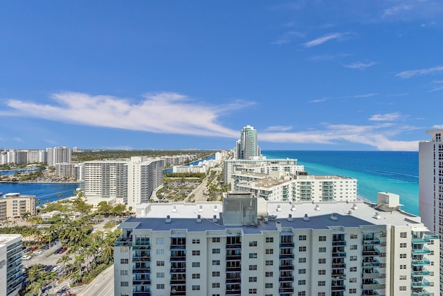 drone / aerial view with a view of city and a water view