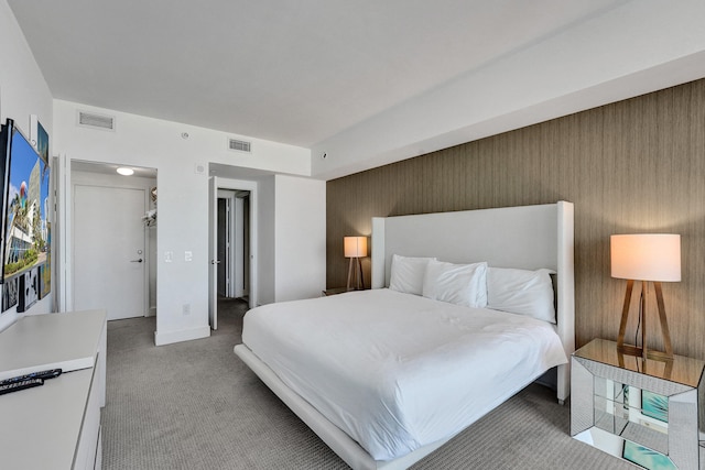 bedroom featuring carpet and visible vents