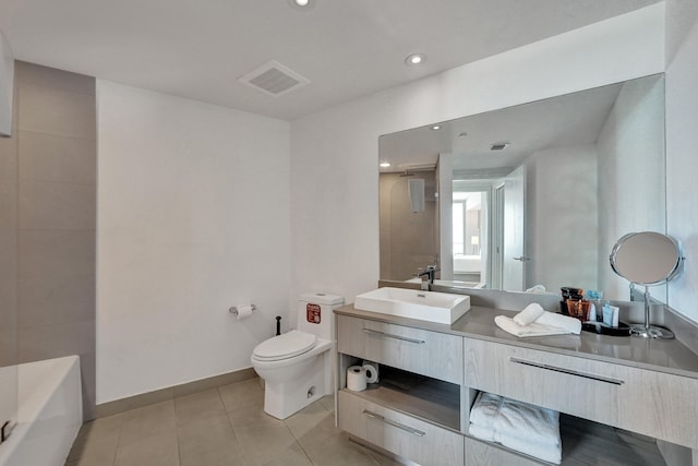 bathroom featuring visible vents, toilet, a bathing tub, tile patterned floors, and vanity