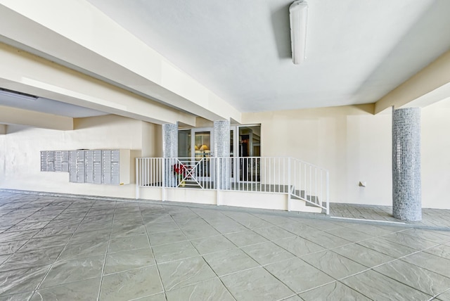 spare room with tile patterned flooring