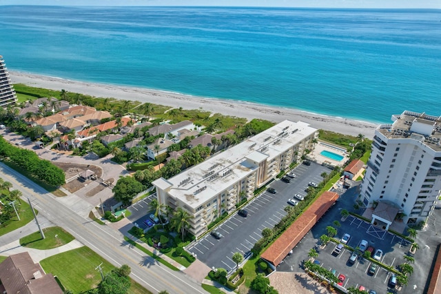 bird's eye view with a view of the beach and a water view