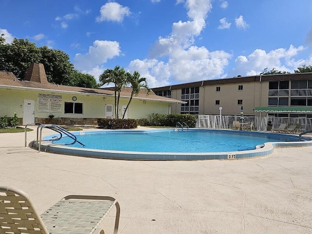 pool featuring fence