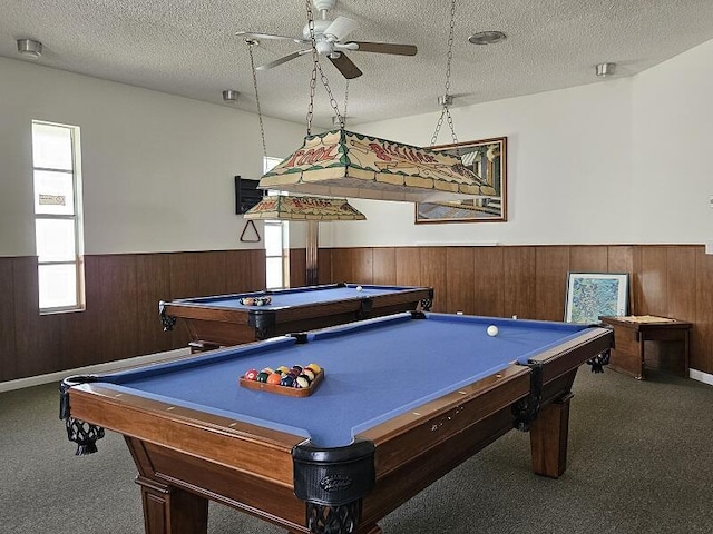 playroom featuring billiards, carpet, a wainscoted wall, ceiling fan, and a textured ceiling