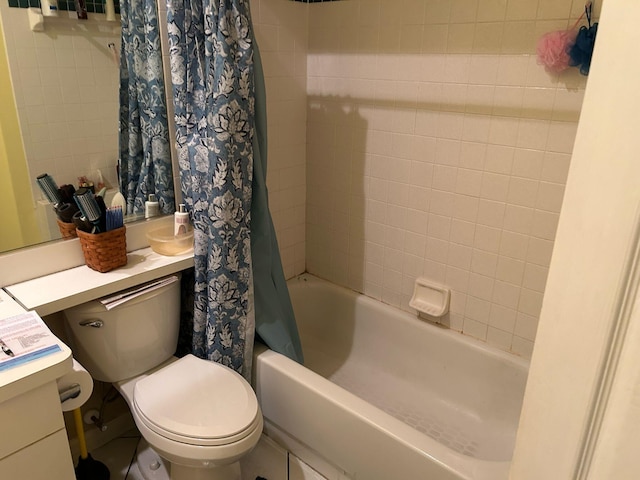 full bath featuring toilet, vanity, and shower / bathtub combination with curtain