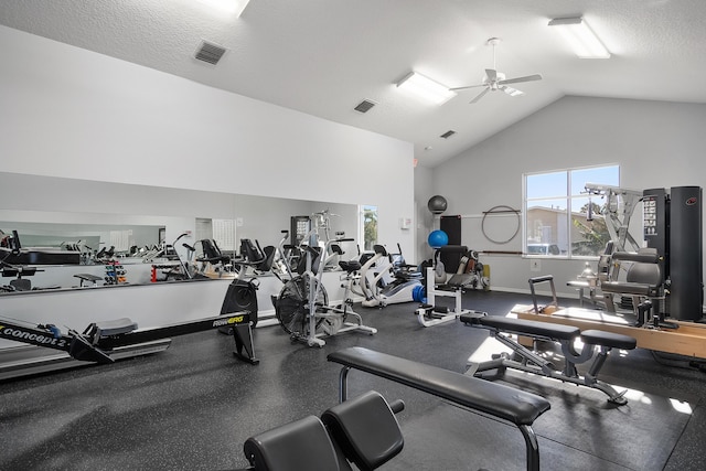 gym with baseboards, a ceiling fan, visible vents, and a textured ceiling