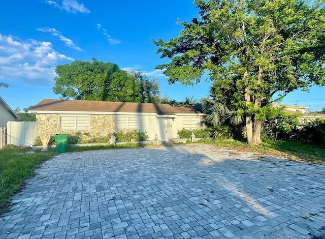 5706 Candlewood, Mangonia Park, FL 33407 - exterior space featuring fence