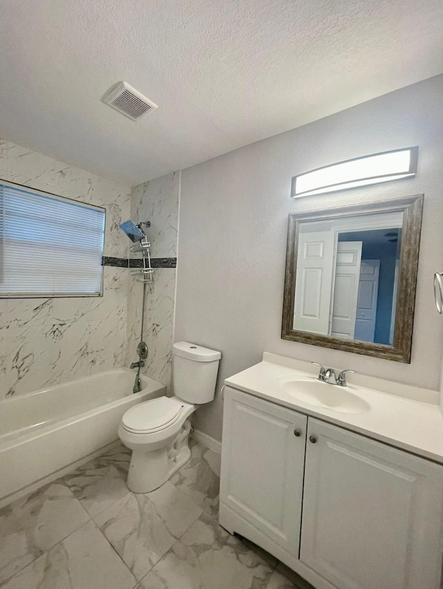 full bath featuring visible vents,  shower combination, a textured ceiling, toilet, and marble finish floor