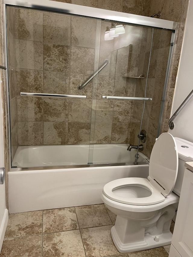 bathroom featuring enclosed tub / shower combo, toilet, and tile patterned flooring