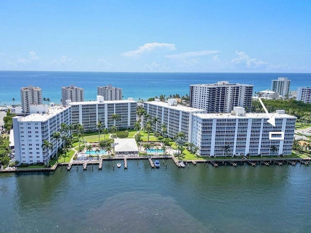 bird's eye view featuring a city view and a water view