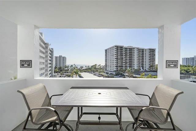 balcony featuring a city view