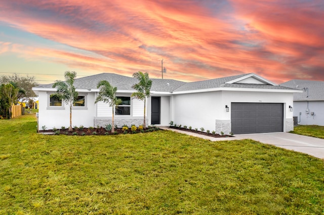 single story home with a front lawn, stone siding, concrete driveway, a shingled roof, and a garage