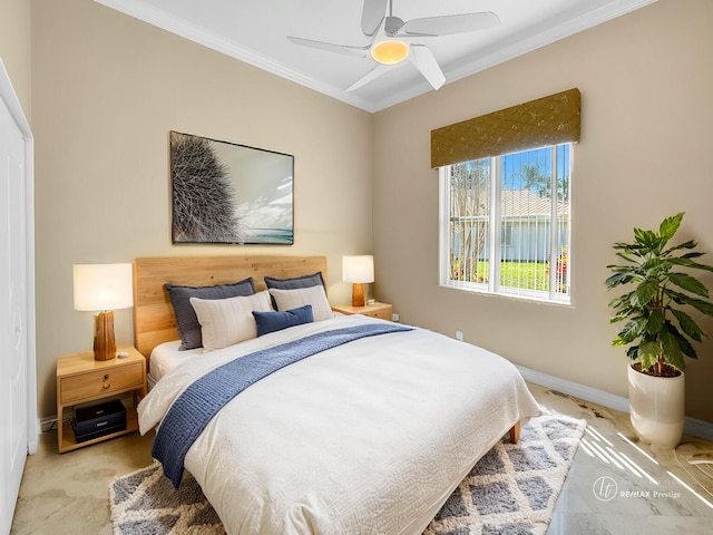 bedroom featuring baseboards, ceiling fan, and crown molding